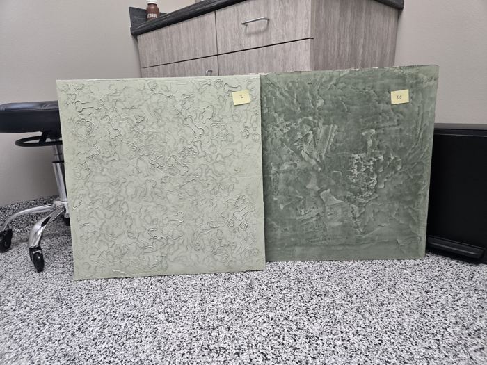 Green stamped relief and green Venetian plaster sample panels